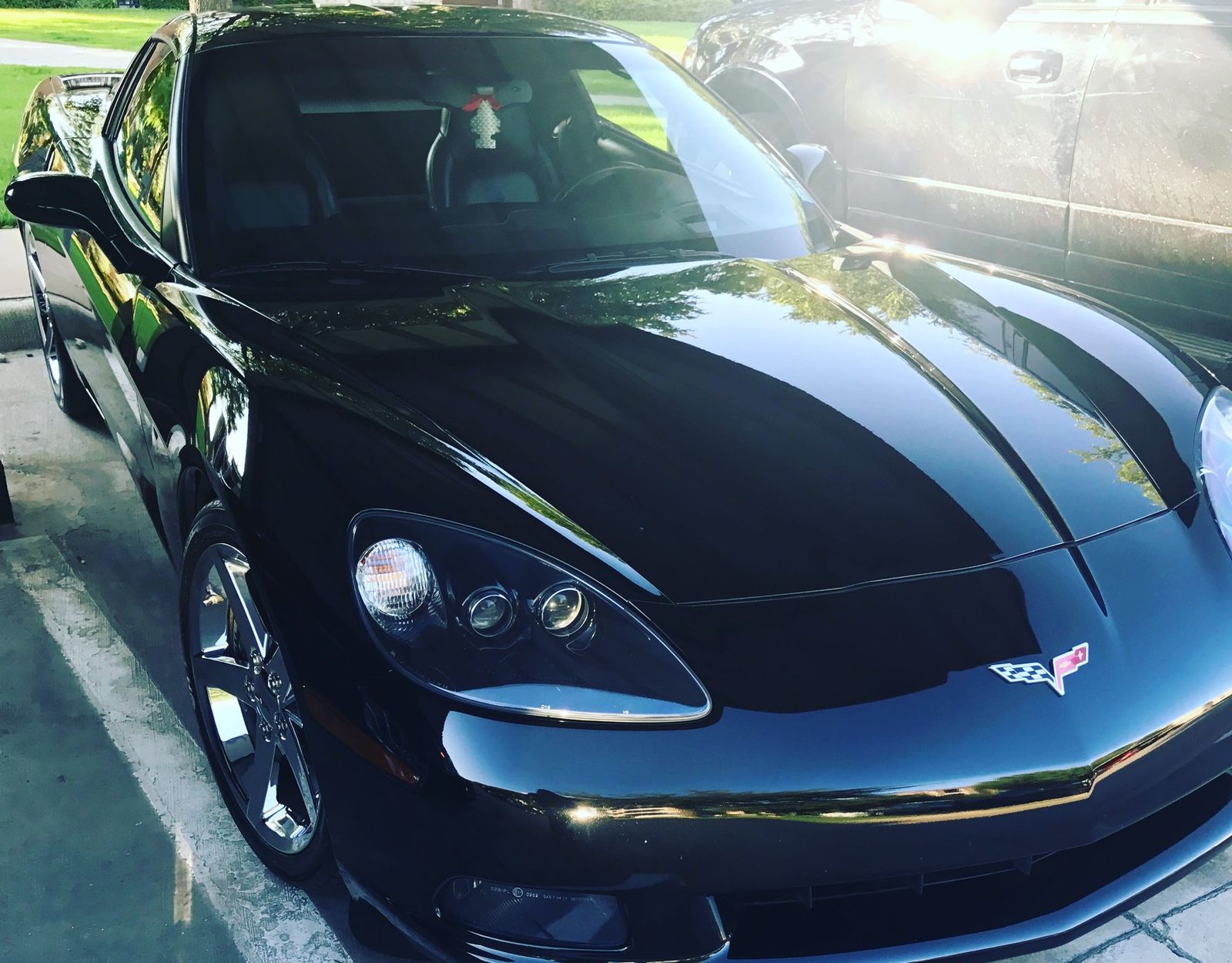 Black Corvette with showroom gloss after detailing